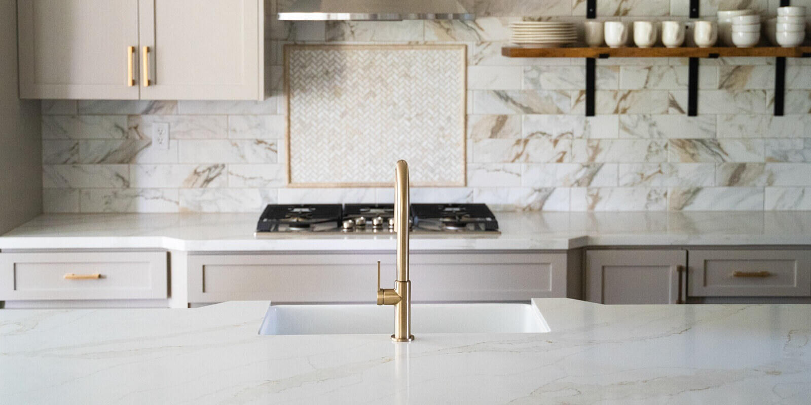 modern kitchen remodel with marble tile backsplash