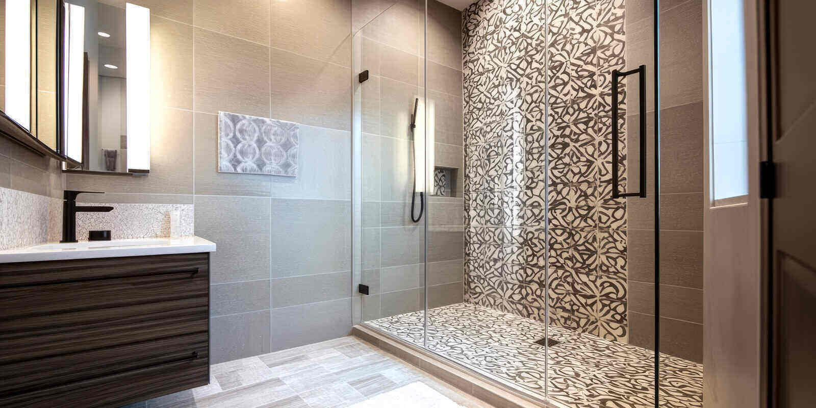 modern bathroom remodel featuring a spacious walk-in shower with unique tile patterns and high-end fixtures in Maryland