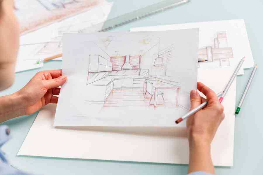 Interior designer drawing pencil sketch of a kitchen. Interior design projects concept in st marys city maryland.