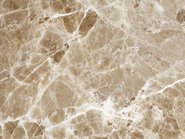 Elegant beige marble surface showcasing smooth texture and subtle natural veins in cream and white tones