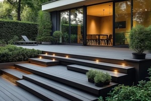outdoor steps lead to contemporary home with large glass doors