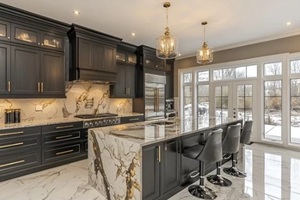 modern dark kitchen island with marble countertops and outdoor views