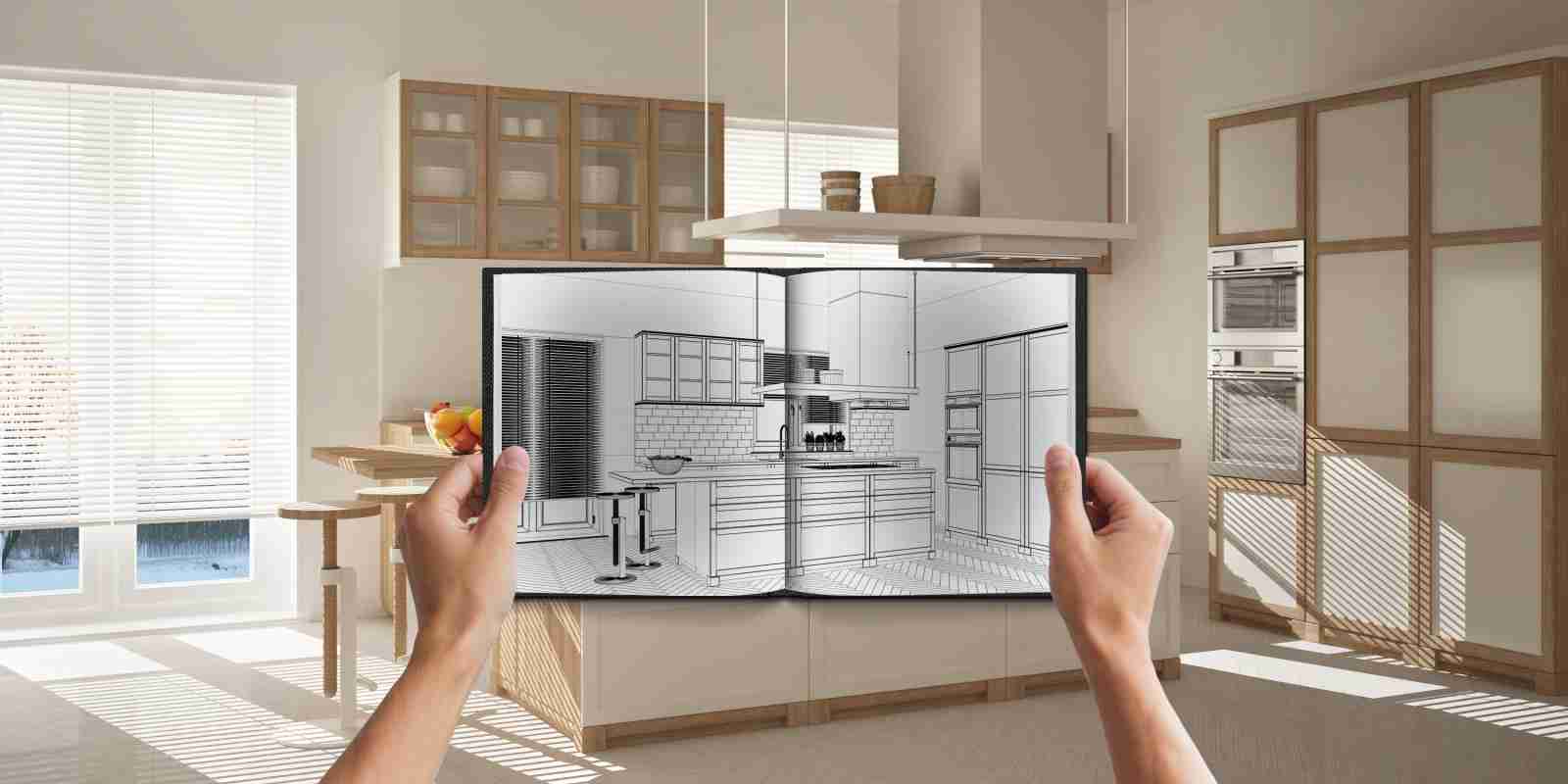 Designer Holding Notepad with Creative Kitchen Design Blueprint