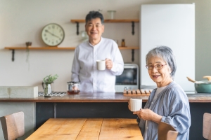 Older Couple Enjoying Coffee in Newly Remodeled House