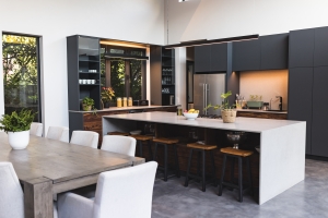 Modern Kitchen with Large Island Bar Stools and Dining Table